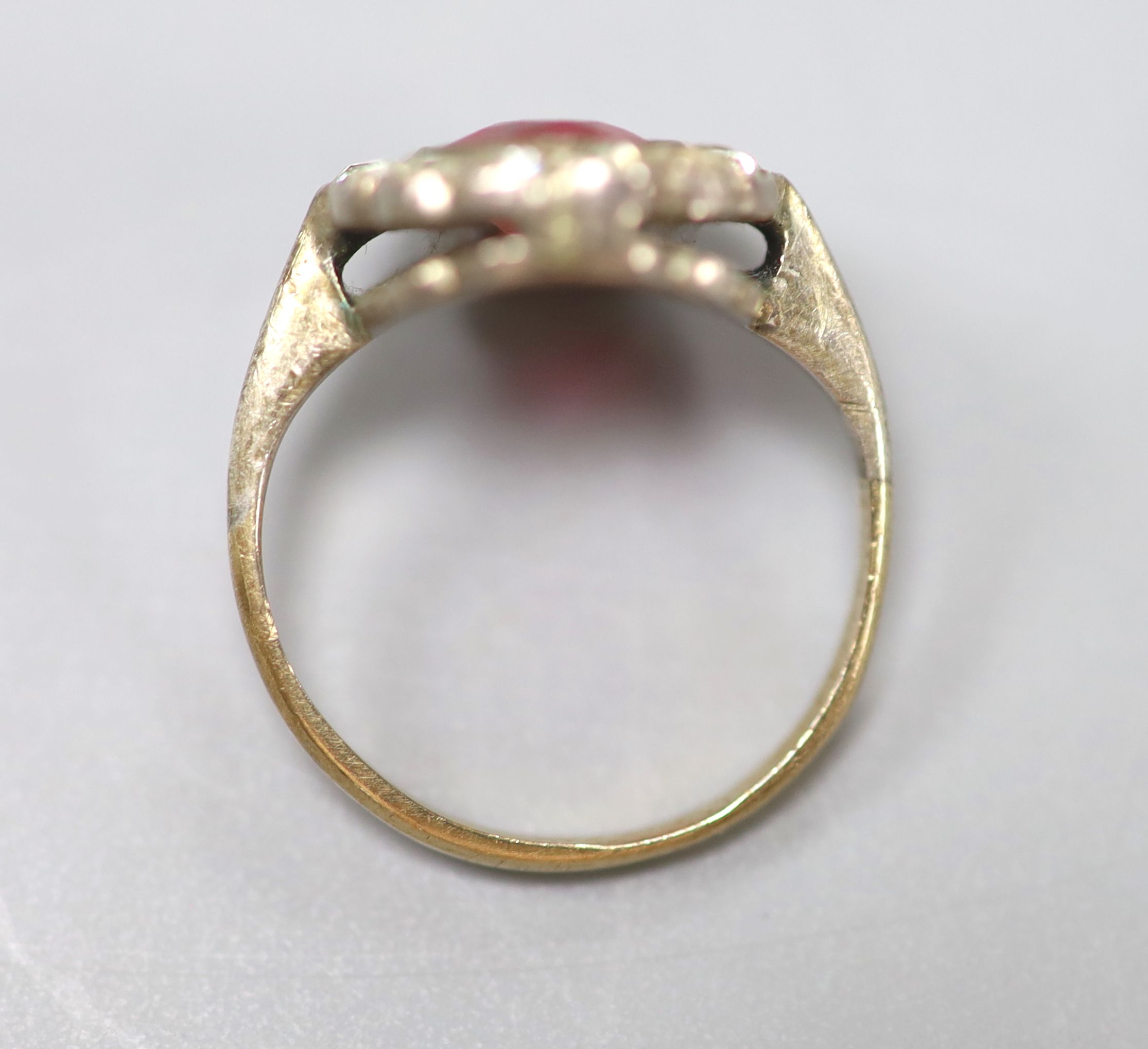 A yellow and white metal, two colour paste set oval ring, size F, gross 3.1 grams.
